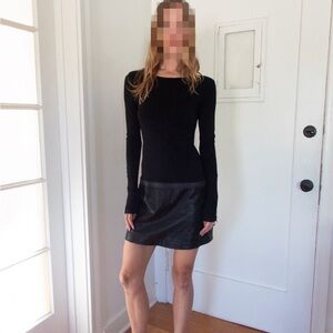 Long sleeve dress with leather skirt and zippers